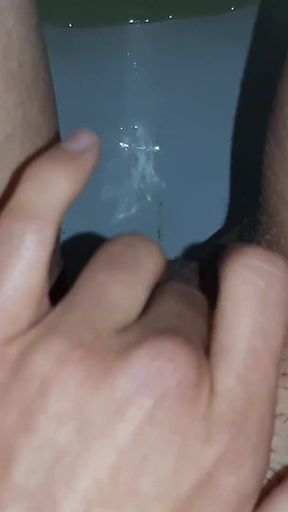 In a Public Toilet, I Jerk off and Pee at the Same Time