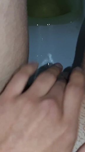 In a Public Toilet, I Jerk off and Pee at the Same Time