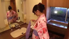 A pretty Japanese woman in the bathtub with her husband, having titfuck and cunnilingus, then in bed, fucking while she rides him, from behind, and cu