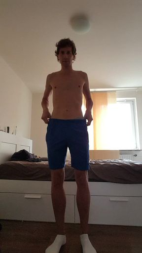 Twink in sportswear strips naked