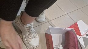 dirty sneakers dirty feet in a public store 4k