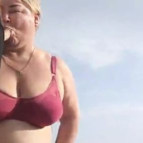 Mother-in-law sucks my dick on the beach and gets cum in her mouth1