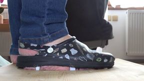 Crushing a slave's face in old shoes without soles