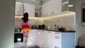 Hottest redhead tattooed cheerleader with over knee socks shows her see through panties in the kitchen
