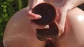 Oiled Outdoor BBC Dildo Double Penetration in the Sunshine