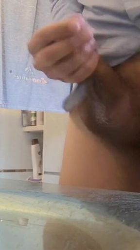 Quick Bathroom Sink Jerkoff with Huge Load of Cum