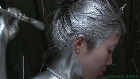 Silver paint Asian pleasured with vibrator