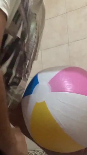 In the bathroom with a beach ball