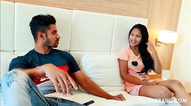 Passionate couple explores each other intimately on a soft bed