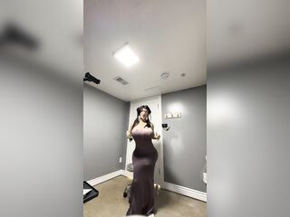 Hawt trans in her hot gray costume teasing her massive titties and booty