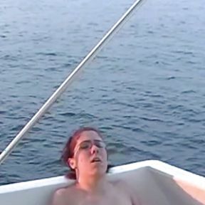 Three horny amateur lesbians eat each others pussies and masturbate while on a boat trip