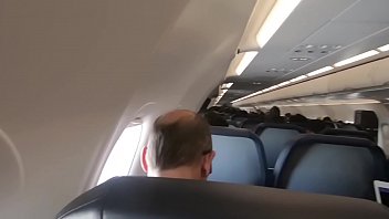 Airline stewardess gives a blowjob in the cockpit
