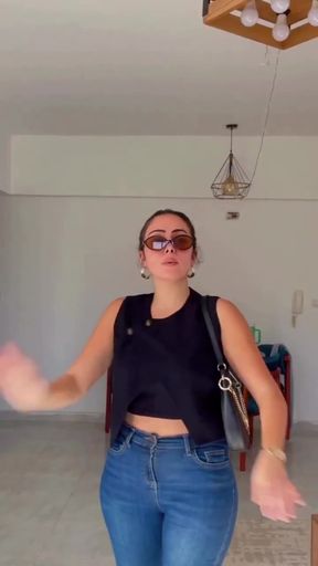 Amateur with big tits shows off her ass