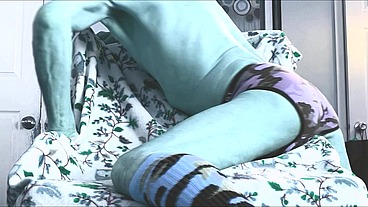 Stop Action Groin Stretching Up Close on Chair with Pattern in Camo Briefs and Socks