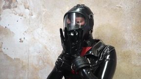 Restrained In Latex And Gasmask