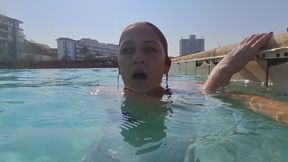 Swimming in a huge swimming pool, and blowing bubbles while I swim