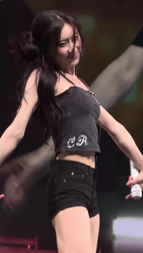 Sexy blonde woman performing on stage