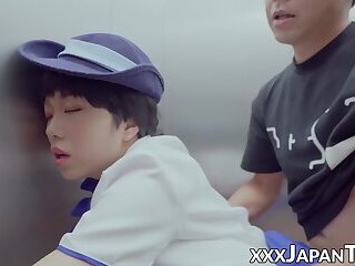 Uniformed Joanne jerks cock before getting banged in the elevator