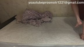 Nastya—barefoot, then in dirty street sneakers, then in platform heels—tramples the bed and mattress, stepping and jumping on the bed, pressing down on it, and rubbing against the bedding.