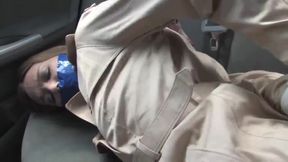 duct tape gagged and hogtied in the car backseat