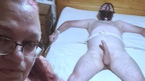 Miss M handjob and cbt used on a naked man spreadeagled on bed