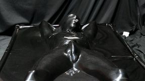 Sealed and vibed in the black latex vacbed