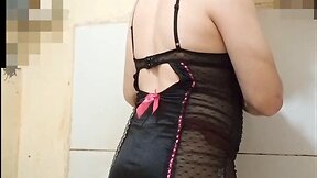 Carol dressed in a tight-fitting camisole