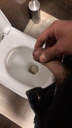 Pissing in a public bathroom