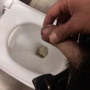 Pissing in a public bathroom