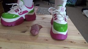 FULL WEIGHT COCK CRUSH UNDER KOI TRAINERS ON THE COCK TABLE WITH CUM SHOT CAM 1 PT2