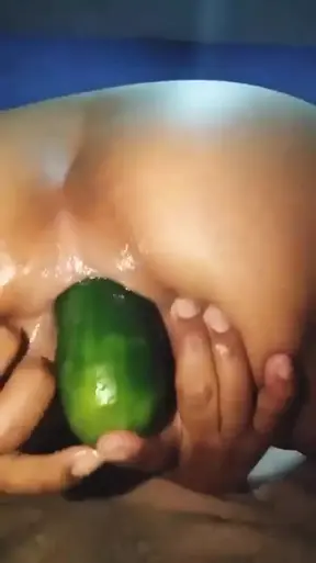 Latina in a fetish scene sticking a huge cucumber in her ass, and sends me the evidence of her open ass