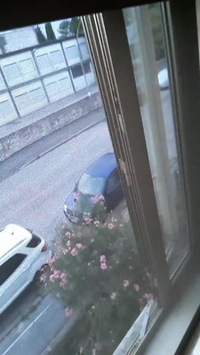 Naked in Front of the Window on a Chair