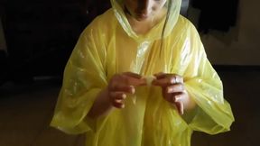 She empties the condom over her face after a blowjob wearing a rain poncho