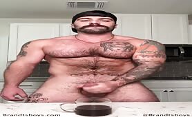Handsome hairy stud rubbing his delicious cock in the kitchen