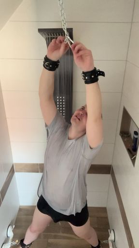 Slave tied in shower with very hot water