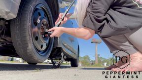 67 Tall Amazon Goddess Changes Her Tire - Big Feet in Frame