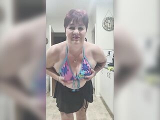 Kiwi Bitch plays with her tits to hawt porn music