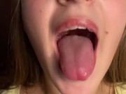 Swallowing gummy bears with open mouth