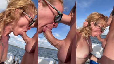 Milf sucks up curved banana cock on boat, public blowjob