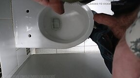 Pissed on a femboys dick in an extreme public toilet