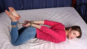 Lisa: barefoot girl in pink long-sleeve and jeans, hogtied with hemp rope, wiggles and wriggles on the bed (HD WMV)