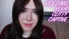 HOLDING YOUR CLITTY CAPTIVE