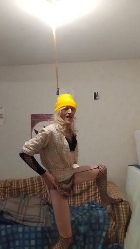 The blonde in the yellow cap shows off all excited...!! ...