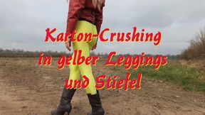 Cardboard crushing in yellow leggings and boots - Karton-Zertreten in gelber Leggings und Stiefeln