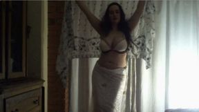Fabulous, erotic, stripping belly dance in white outfit