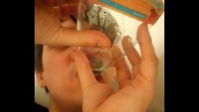 Drinking pee from a girl with big piss flaps using a funnel