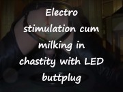 Electro stimulation cum milking in chastity with LED buttplug