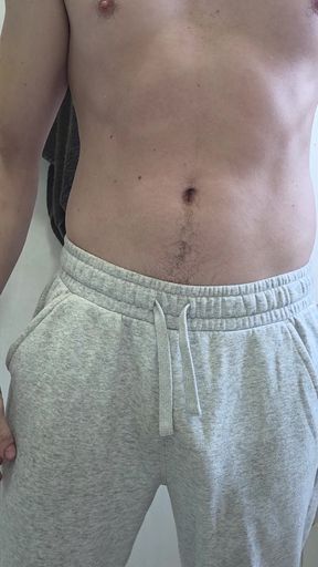 Shirtless man in sweatpants