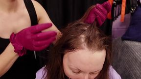 Slave girl hair cutting
