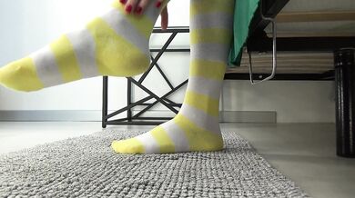 Busty hairy milf licks her big pussy in striped knee-highs